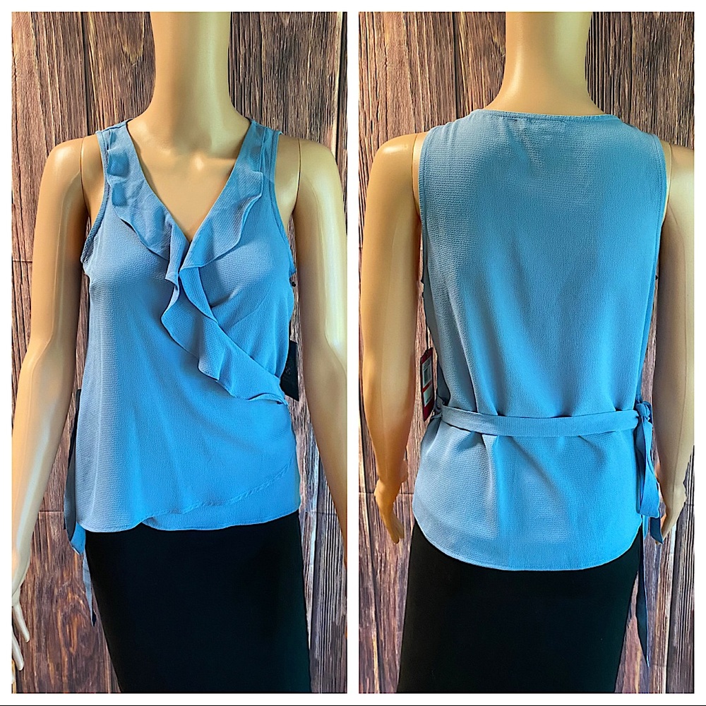 Vince Camuto NWT size xs beautiful light blue wrap tie no sleeve flowy blouse